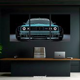 BMW M3 tri-panel poster by Dripster featuring a blue BMW M3 front view in an office setting