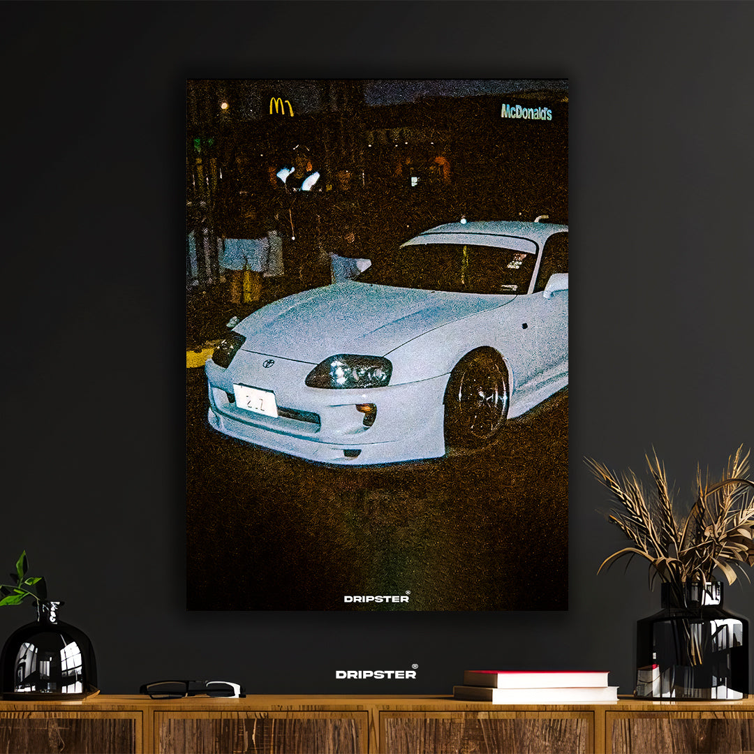 JDM Supra poster by Dripster featuring a white Toyota Supra car at night with McDonalds signs in the background