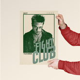 Fight Club Tyler Durden poster by Dripster held by person wearing red long sleeve shirt