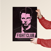 Dripster Fight Club wall poster featuring split face art in black and pink held by hands