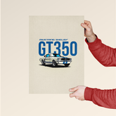 Mustang Shelby GT350 poster held by person wearing red jacket showcasing classic car design