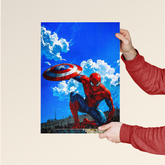 Spider-Man Captain America shield poster held by person with blue sky and clouds background