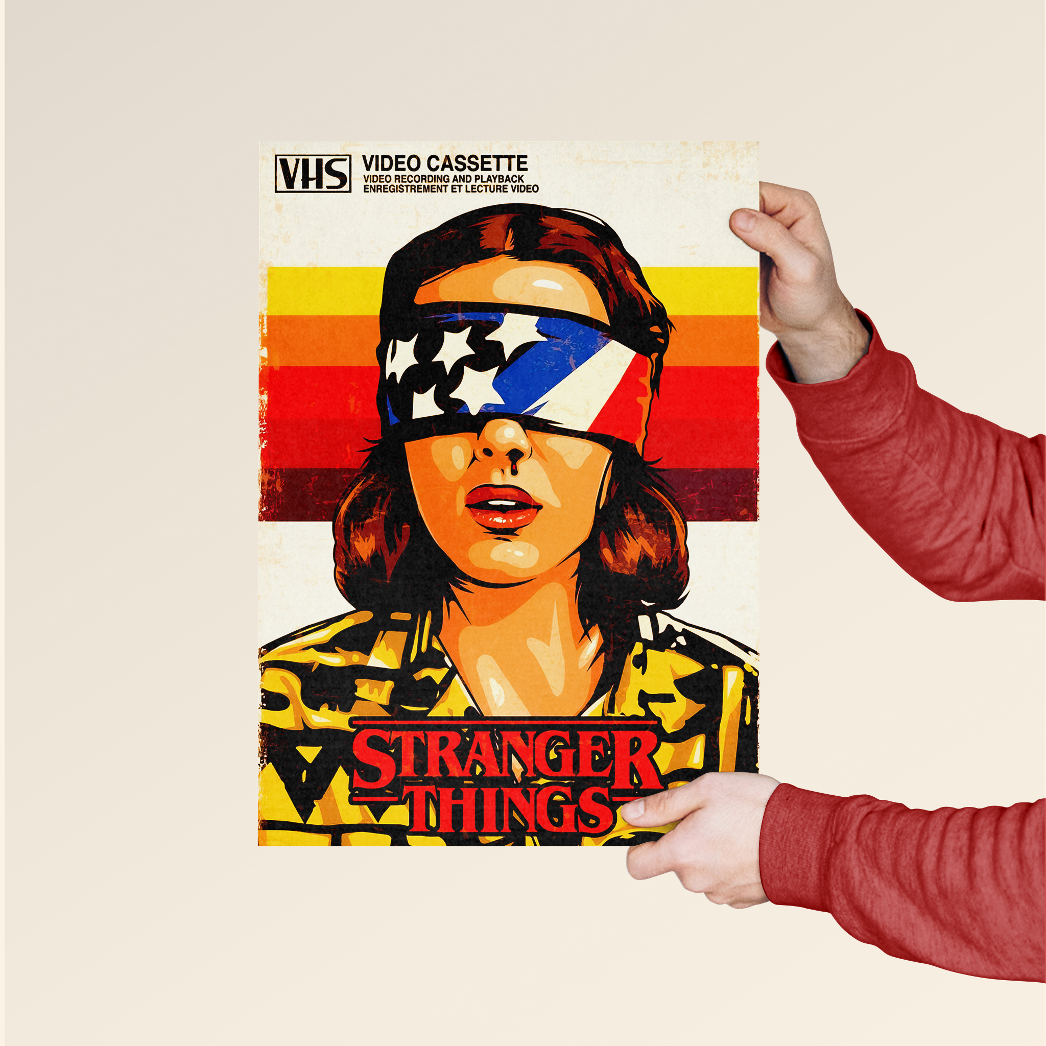 Stranger Things Eleven poster by Dripster featuring Eleven with a blindfold in retro VHS style